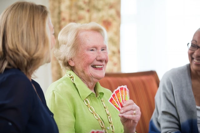 Seniors playing card game