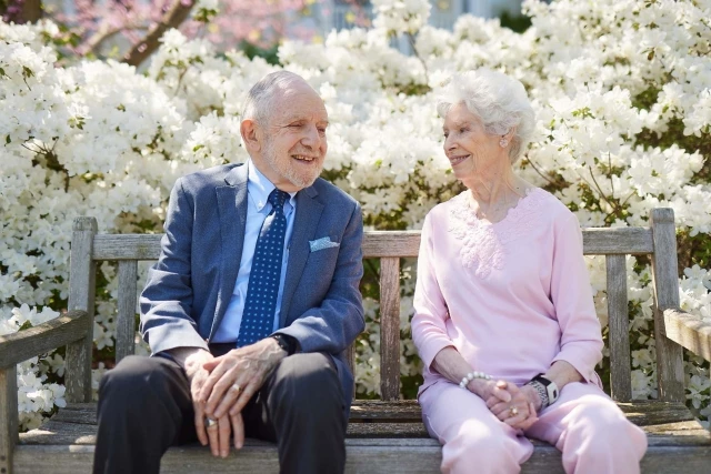 Senior couple sitting outdoors