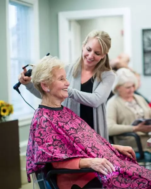 Women having her hair done in salon