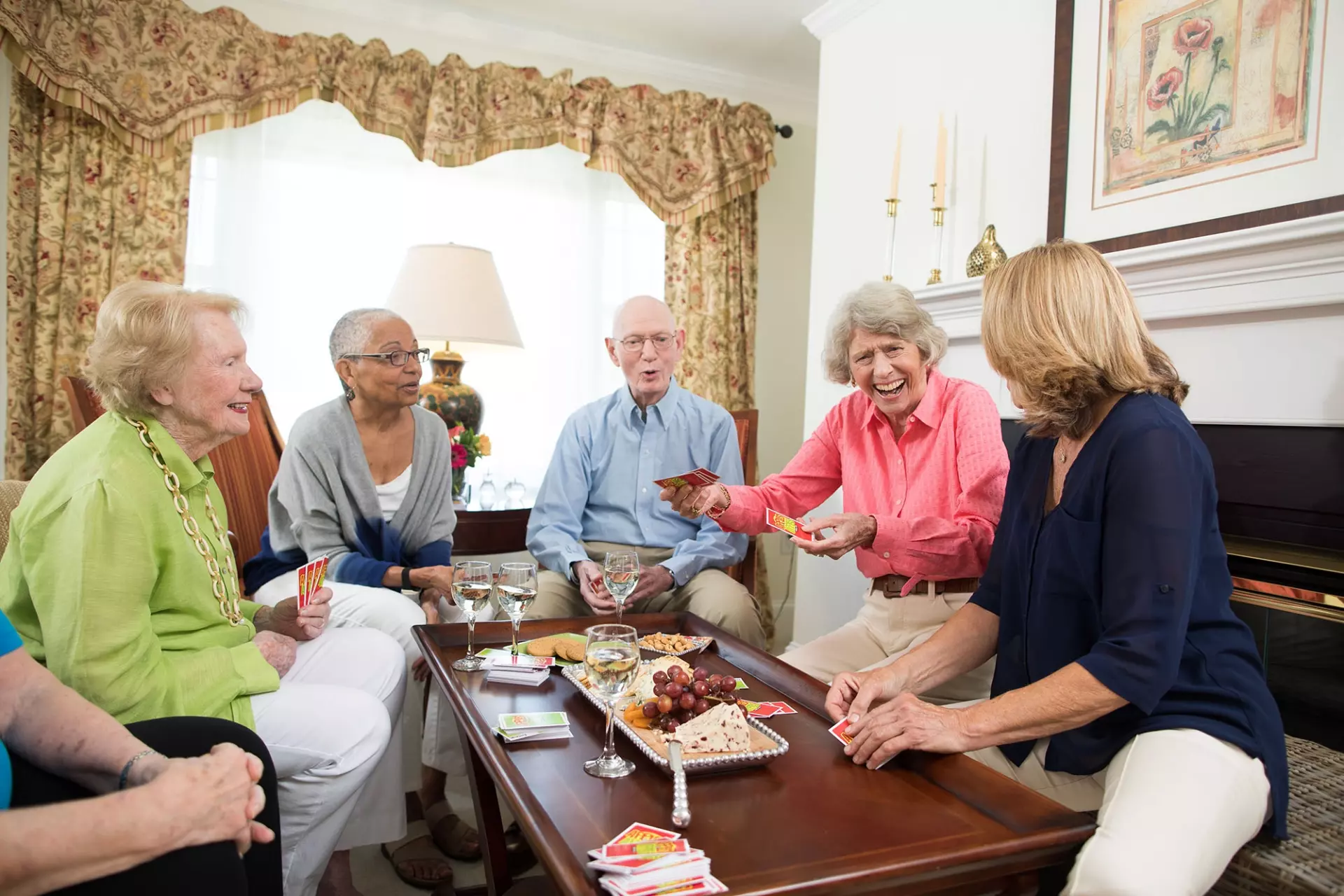 Seniors playing card game