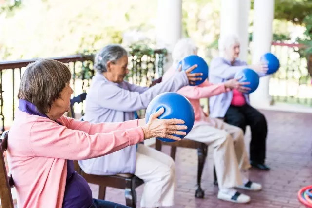 Seniors in exercise group activity