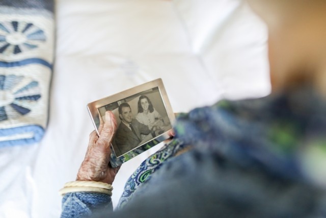 Woman looking at photo