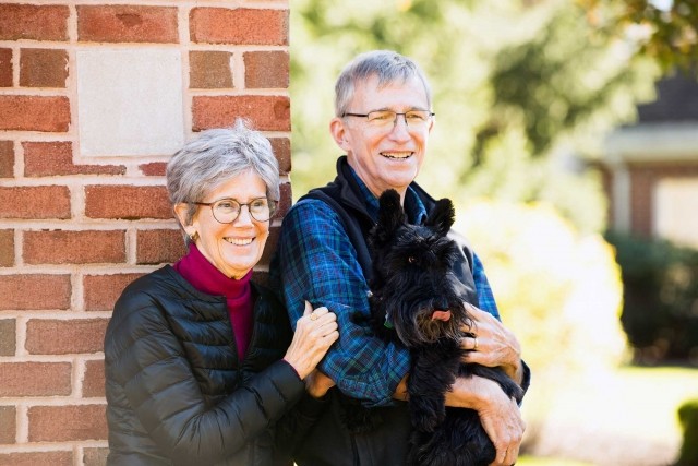 Senior couple with dog