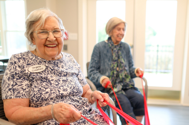 Resident Virginia Crawford stretch class