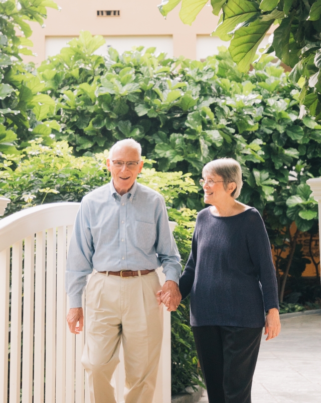 Interior atrium bridge resident couple