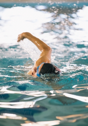 Resident swimming in the pool