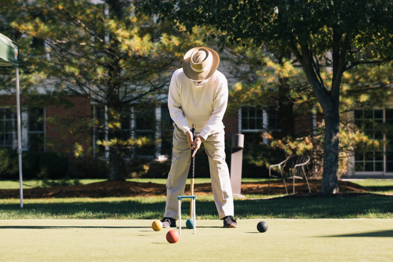 Resident playing Croquet