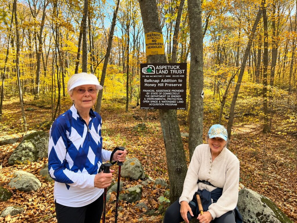 Meadow Ridge residents Diane B. and Bobbi H. enjoy a fall hike at the Aspetuck Land Trust’s Belknap Addition to Honey Hill Preserve.
