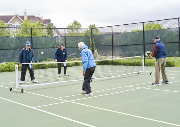 Meadow Ridge residents playing pickleball